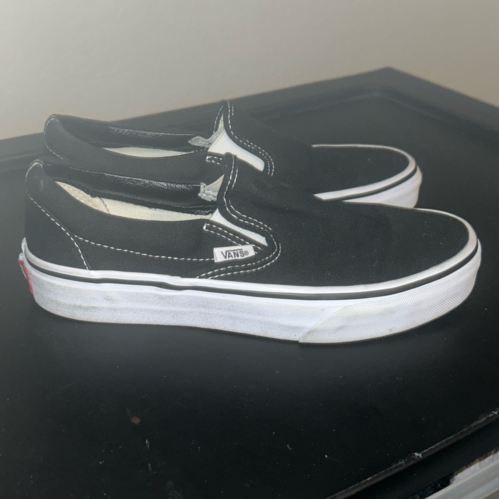 Vans classic black and white slip on